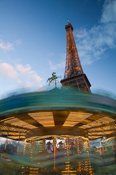 Europe, France, Paris, Eiffel Tower Area: Evening View of the Eiffel Tower & Carousel