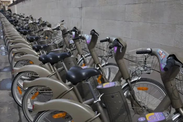 Framed Print : Europe, France, Paris. Line of bicycles for rent in the Velib bike transit system