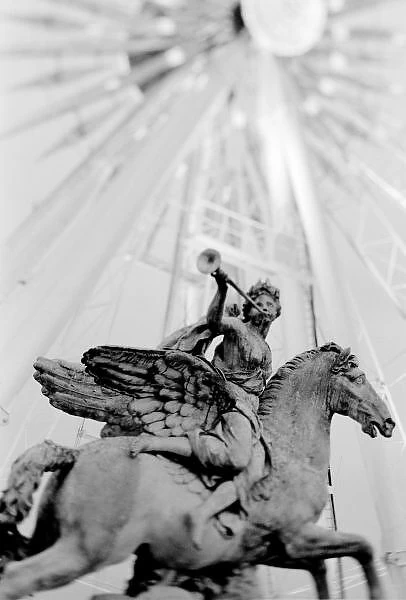 Europe, France, Paris. Statue and Ferris Wheel, Jardin des Tuileries