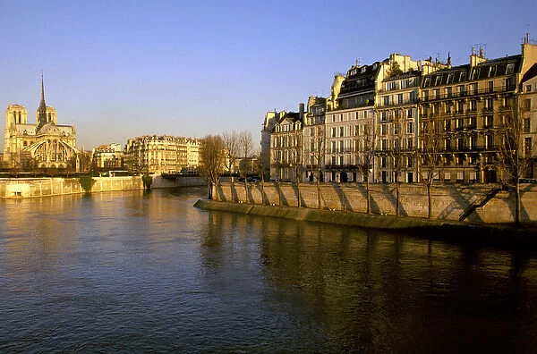 Europe, France, Paris. Sunset on the Seine with Notre Dame in background