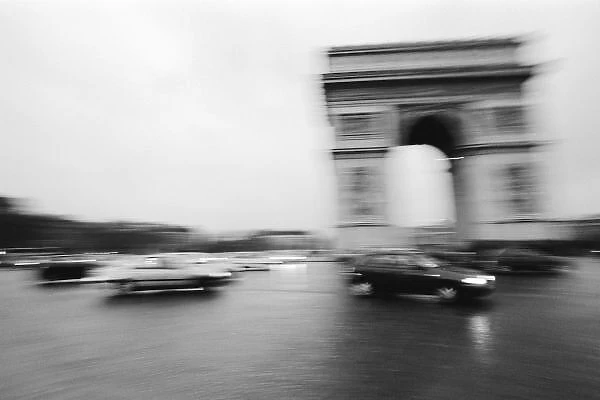 Europe, France, Paris. Traffic at the Arc de Triomphe