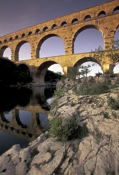 Europe, France, Provence, Gard; Pont du Gard Roman aqueduct and bridge; sunset light