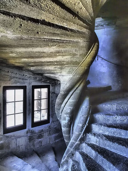 Europe, France, Provence, Lourmarin. Spiral staircase in the Chateau de Lourmarin