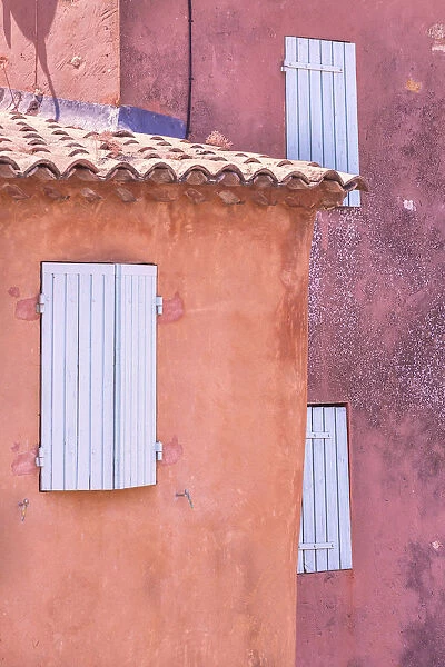 Europe, France, Provence, Roussillon. Window shutters in buildings