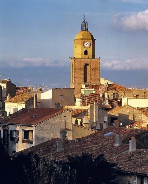 Europe, France, St. Tropez. The clock tower in St. Tropez collects the evening sun