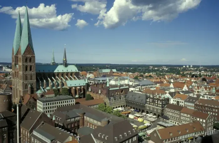 Framed Print : Europe, Germany, Lubeck. Old city center, Kohl market square. St. Marien church on left Framed Print : Europe, Germany, Lubeck. Old city center, Kohl market square. St. Marien church on left