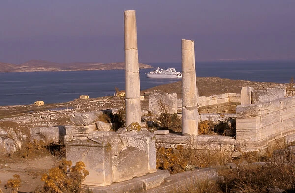 Europe, Greece, Delos. Temple ruins and cruise ship
