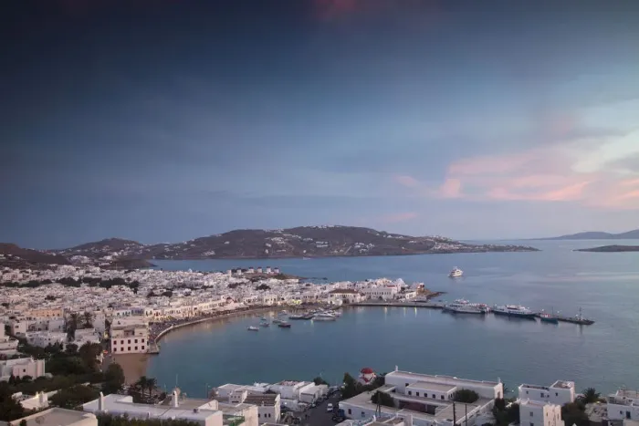 Framed Print : Europe, Greece, Greek Isles, Mykonos, Horia, Overviewing the harbor below, near Sunset