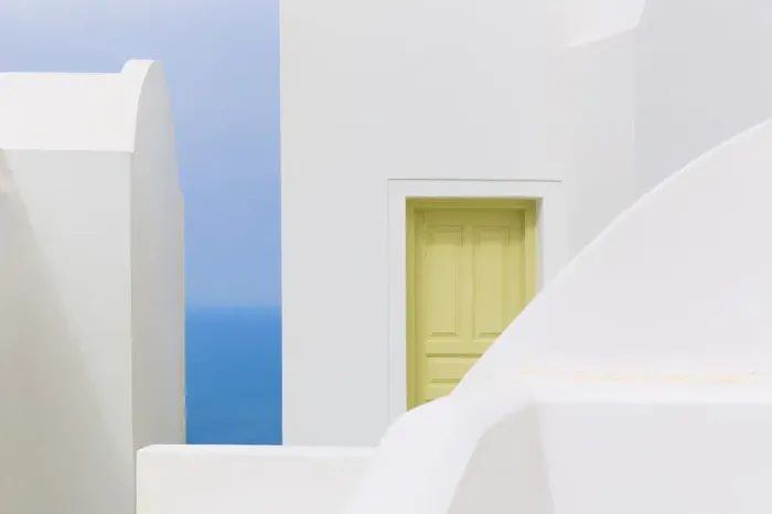 Framed Print : Europe, Greece, Imerovigli. White building shapes and door