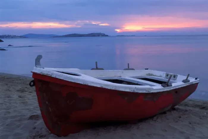 Framed Print : Europe, Greece, Mykonos, red boat on beach at sunset Framed Print : Europe, Greece, Mykonos, red boat on beach at sunset