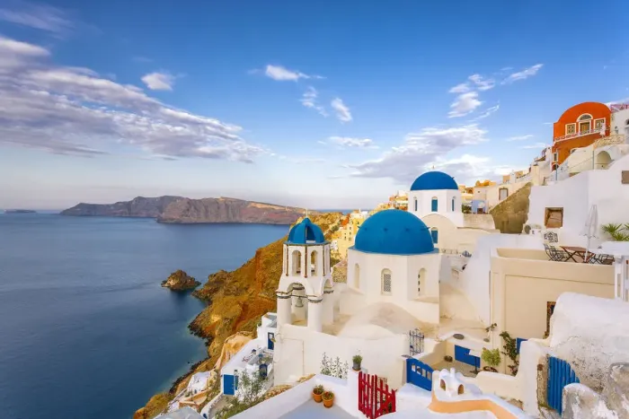 Framed Print : Europe, Greece, Oia. Greek Orthodox church and village
