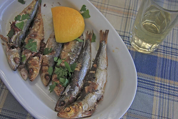 Europe, Greece, Paros, Naoussa. Fresh fish cooked in the local style