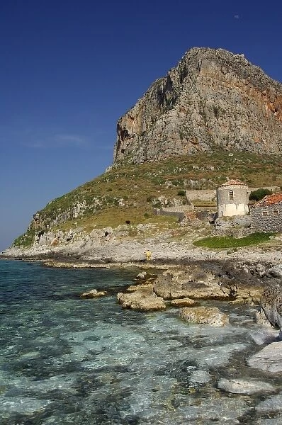 Europe, Greece, Peloponnese, Monemvasia. The Rock of Monemvasia set against the clear Aegean Sea