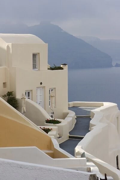 Europe, Greece, Santorini, Thira, Oia. Pathway to end villa overlooking the sea. Credit as