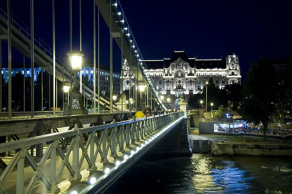 Europe, Hungary, Budapest. Chain Bridge over the River Danube at night. Credit as