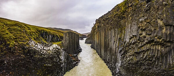 Europe, Iceland. Panoramic aerial view of the basalt columns lining the Studlagil river