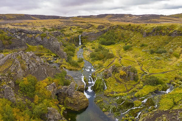 Europe, Iceland. Panoramic aerial view of Gjain waterfalls in a tranquil
