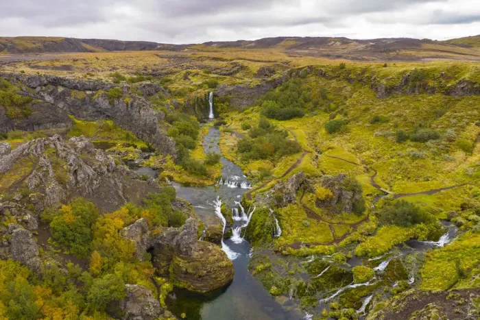 Framed Print : Europe, Iceland. Panoramic aerial view of Gjain waterfalls in a tranquil