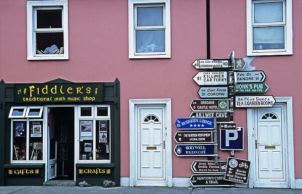 Europe, Ireland, Ballyvaughan. Storefront and direction signs. Credit as: Dennis