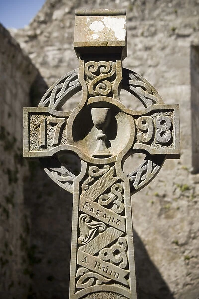 Europe, Ireland, County Mayo, Burrishoole Abbey. Stone Celtic cross dated 1798 within