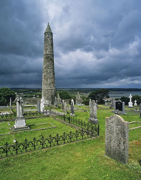 Europe, Ireland, County Waterford. The medieval Ardmore Church, cemetery, and Round Tower