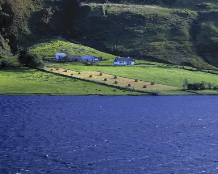 Framed Print : Europe, Ireland, Glenties. A small farm near Glenties is bordered by vivid blue water Framed Print : Europe, Ireland, Glenties. A small farm near Glenties is bordered by vivid blue water
