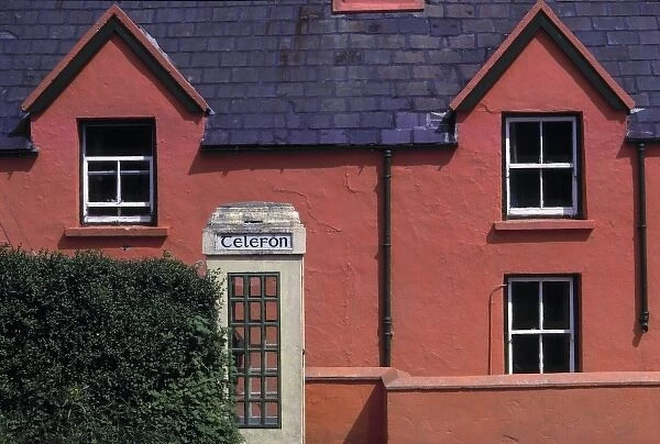 Europe, Ireland, Ring of Kerry. In Castlecove, this salmon-colored building invites a closer look