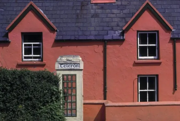 Framed Print : Europe, Ireland, Ring of Kerry. In Castlecove, this salmon-colored building invites a closer look Framed Print : Europe, Ireland, Ring of Kerry. In Castlecove, this salmon-colored building invites a closer look