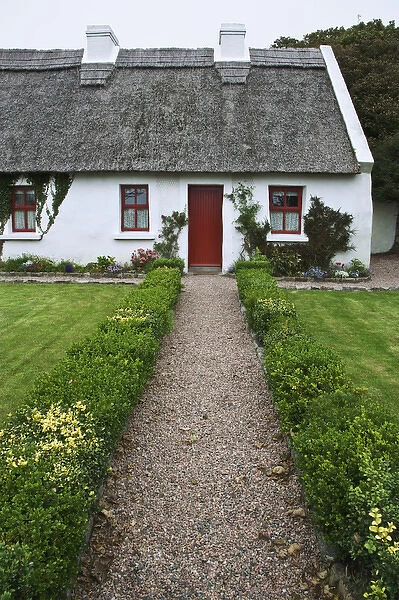 Europe, Ireland, Spiddal. Thatched-roof cottage. Credit as: Dennis Flaherty  /  Jaynes