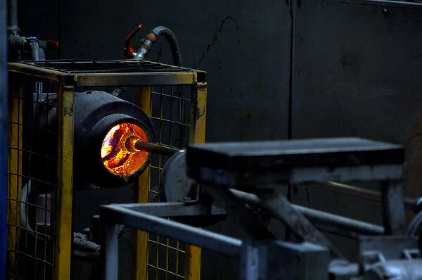 Europe, Ireland, Waterford. Waterford Crystal Factory. Glass oven, molten glass