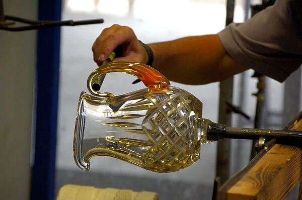 Europe, Ireland, Waterford. Waterford Crystal Factory. Molten glass handle for pitcher