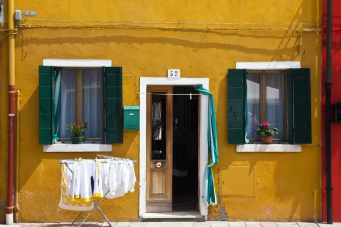 Framed Print : Europe; Italy; Burano; Bright Colored Home with Laundry Out