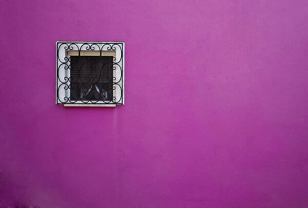 Europe; Italy; Burano; Window and Wall of a Bright Colored Home