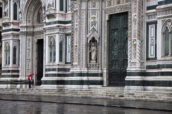 Europe, Italy, Florence. The entrance of Santa Maria del Fiore Cathedral on a rainy day