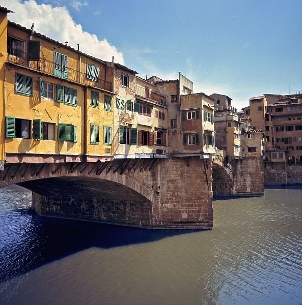 Europe, Italy, Florence. The Ponte Vecchio, a World Heritage Site, spans the Arno River in Florence