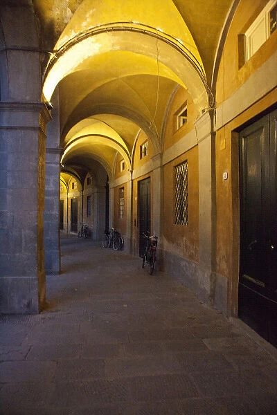 Europe; Italy; Lucca; Evening and Lighted Arched Hallway