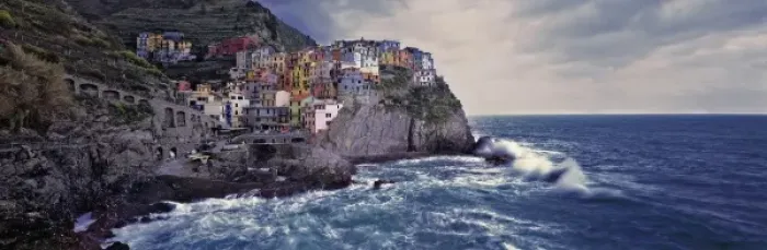 Framed Print : Europe, Italy, Manarola. The colorful dwellings of Manarola are nestled into Framed Print : Europe, Italy, Manarola. The colorful dwellings of Manarola are nestled into