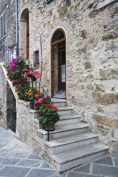 Europe, Italy, Petroio. Flowers line a stairway
