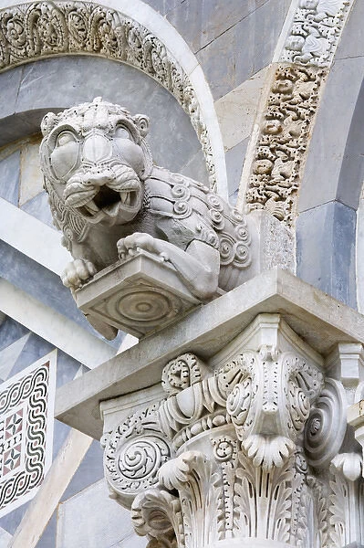 Europe, Italy, Pisa. A gargoyle above the front door of the historic Duomo Pisa or