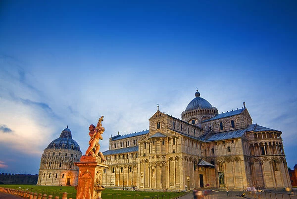 Europe, Italy, Pisa. Pisa Cathedral and statue at sunset