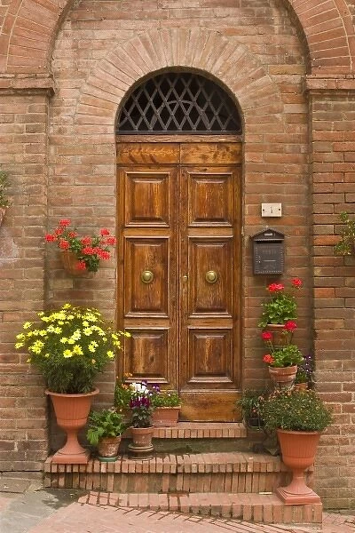 Europe, Italy, Tuscany, Certaldo. Elegant doorway on a brick house