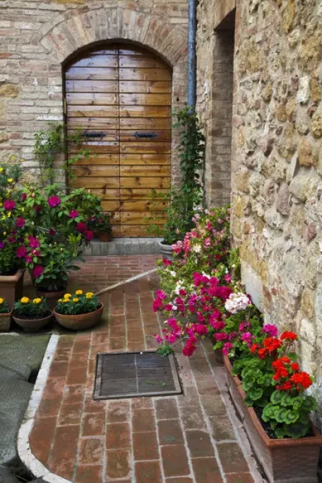 Framed Print : Europe; Italy; Tuscany; Pienza; Doorway withFlowers Around them Framed Print : Europe; Italy; Tuscany; Pienza; Doorway withFlowers Around them