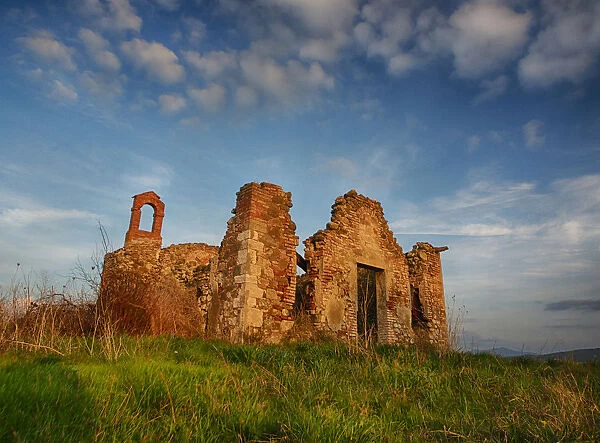 Europe; Italy; Val Di Orcia Tuscany; Old Church ruins with evening light