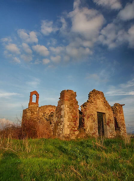 Europe; Italy; Val Di Orcia Tuscany; Old Church ruins with evening light
