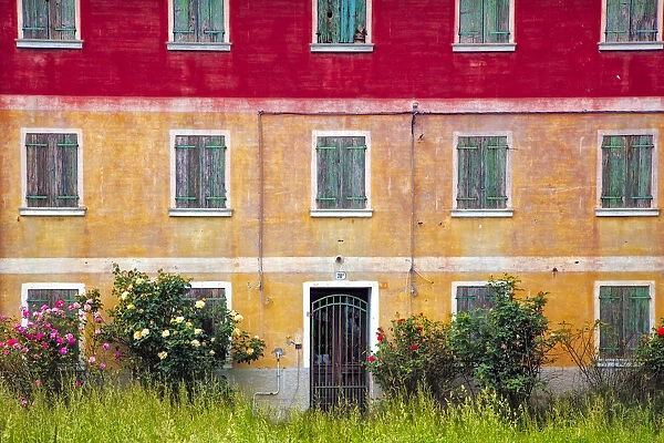 Europe, Italy, Veneto. Colorful farmhouse exterior