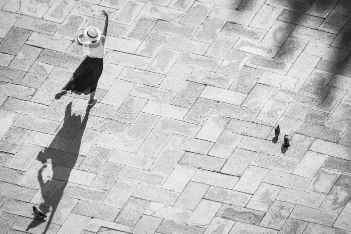 Framed Print : Europe, Italy, Venice. Black and white of tourist poising for photo on San Marco Square Framed Print : Europe, Italy, Venice. Black and white of tourist poising for photo on San Marco Square