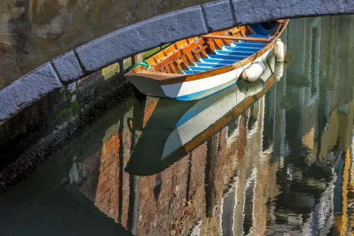 Framed Print : Europe, Italy, Venice. Boat underneath bridge