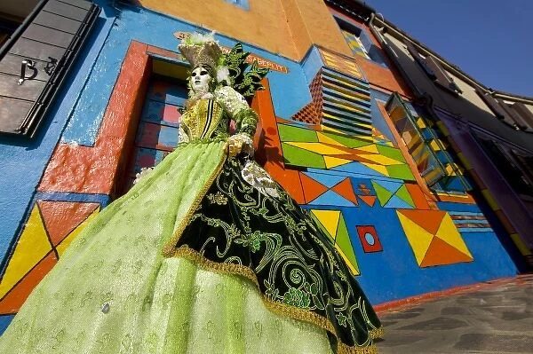 Europe, Italy, Venice, Burano Island. Woman dressed in costume for the annual Carnival