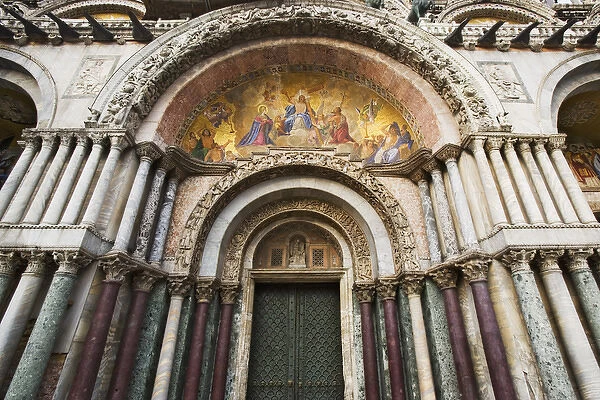 Europe, Italy, Venice. detail of the carvings and facade Mosaics on the Basilica San Marco-Venice
