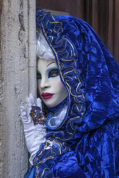 Europe, Italy, Venice. Close-up of woman in Carnival costume